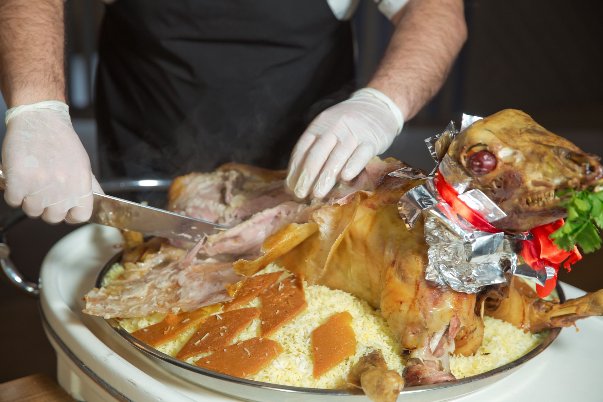 Roasted meat over an open fire, cooked in a special way. Barbecue is prepared of lamb or sheep meat and processed by slasher. Shah pilaf. Many Cooking Traditional Azerbaijan roasting lamb barbecues.